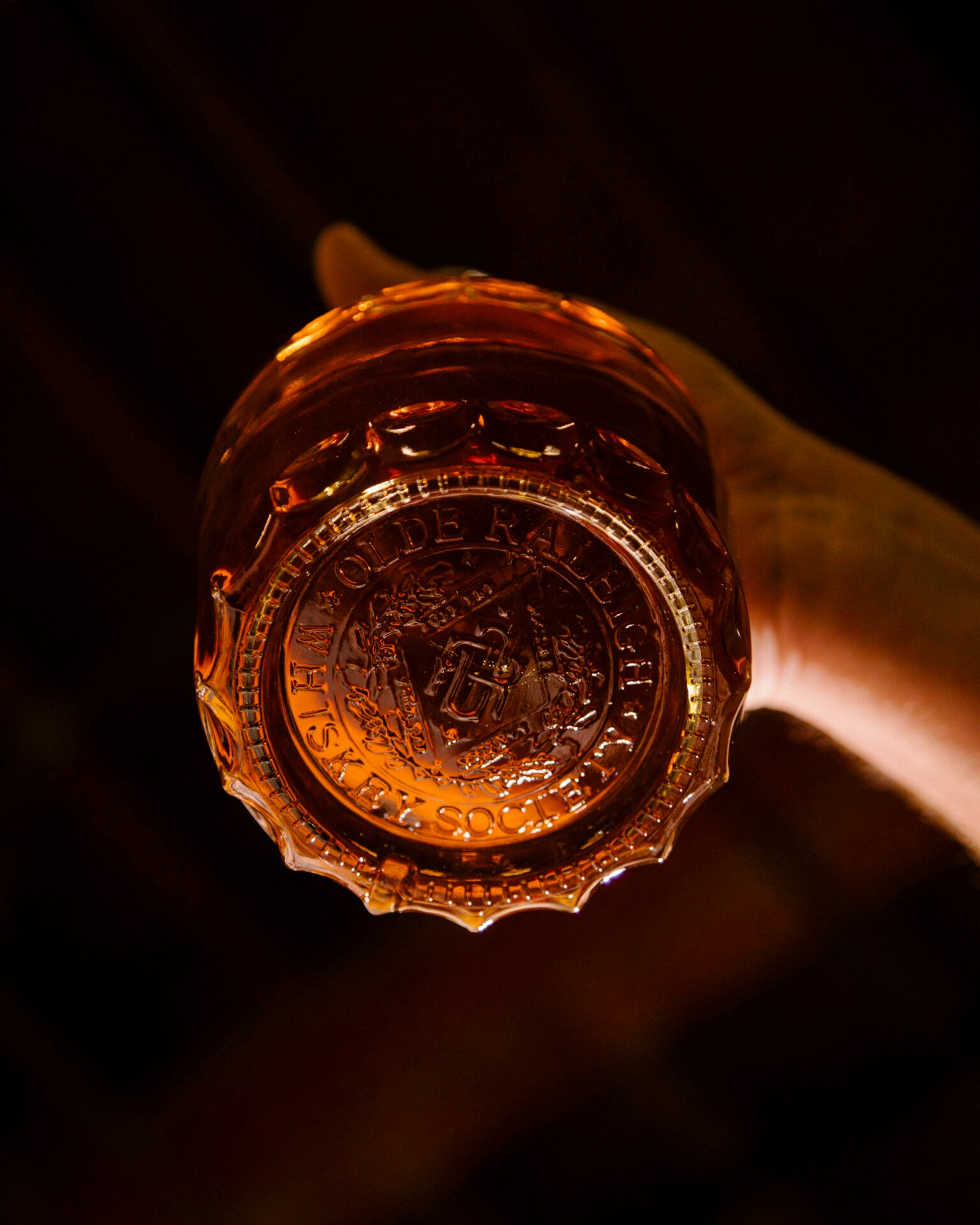 bottom of olde raleigh distillery bottle