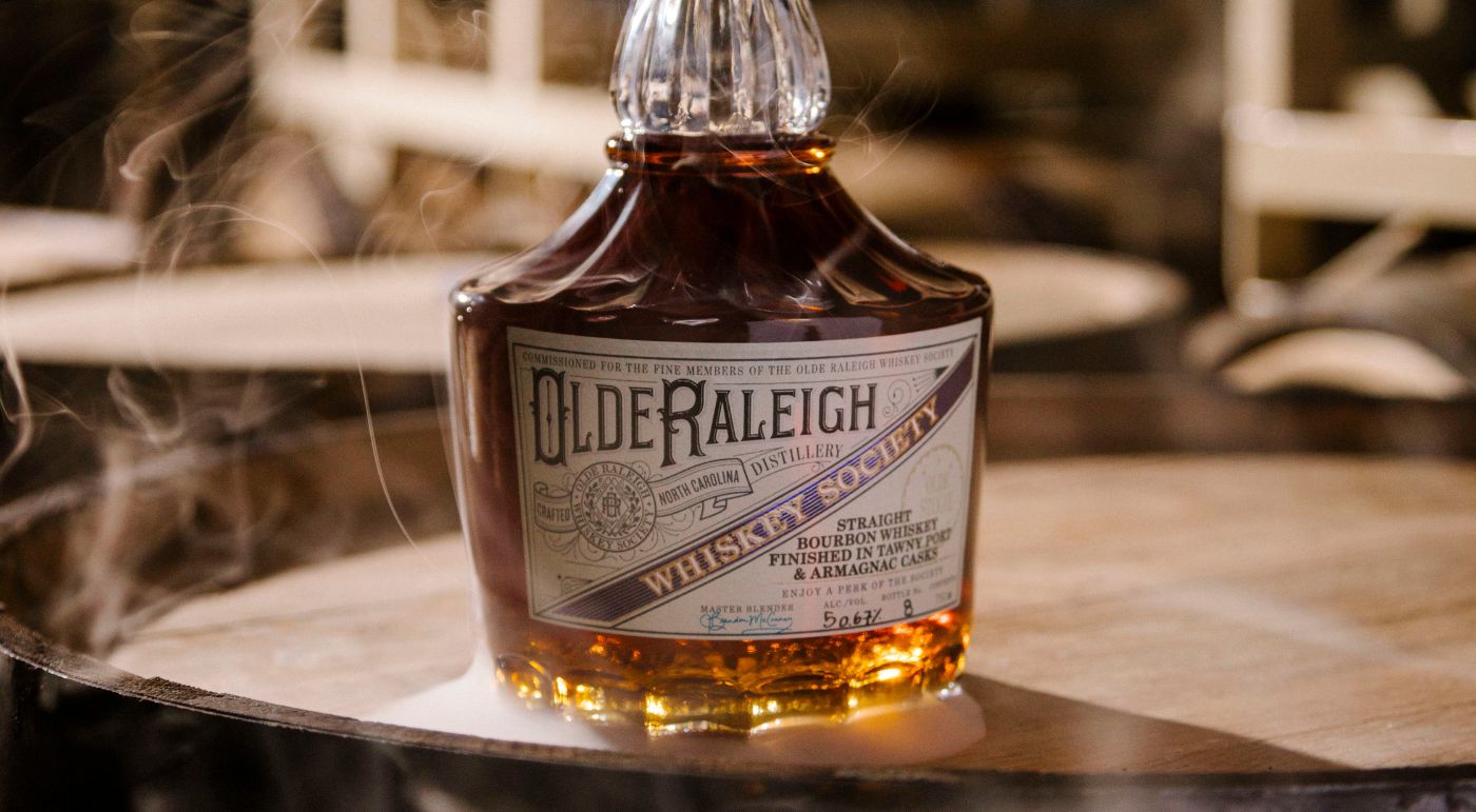 olde stogie bottle with smoke around