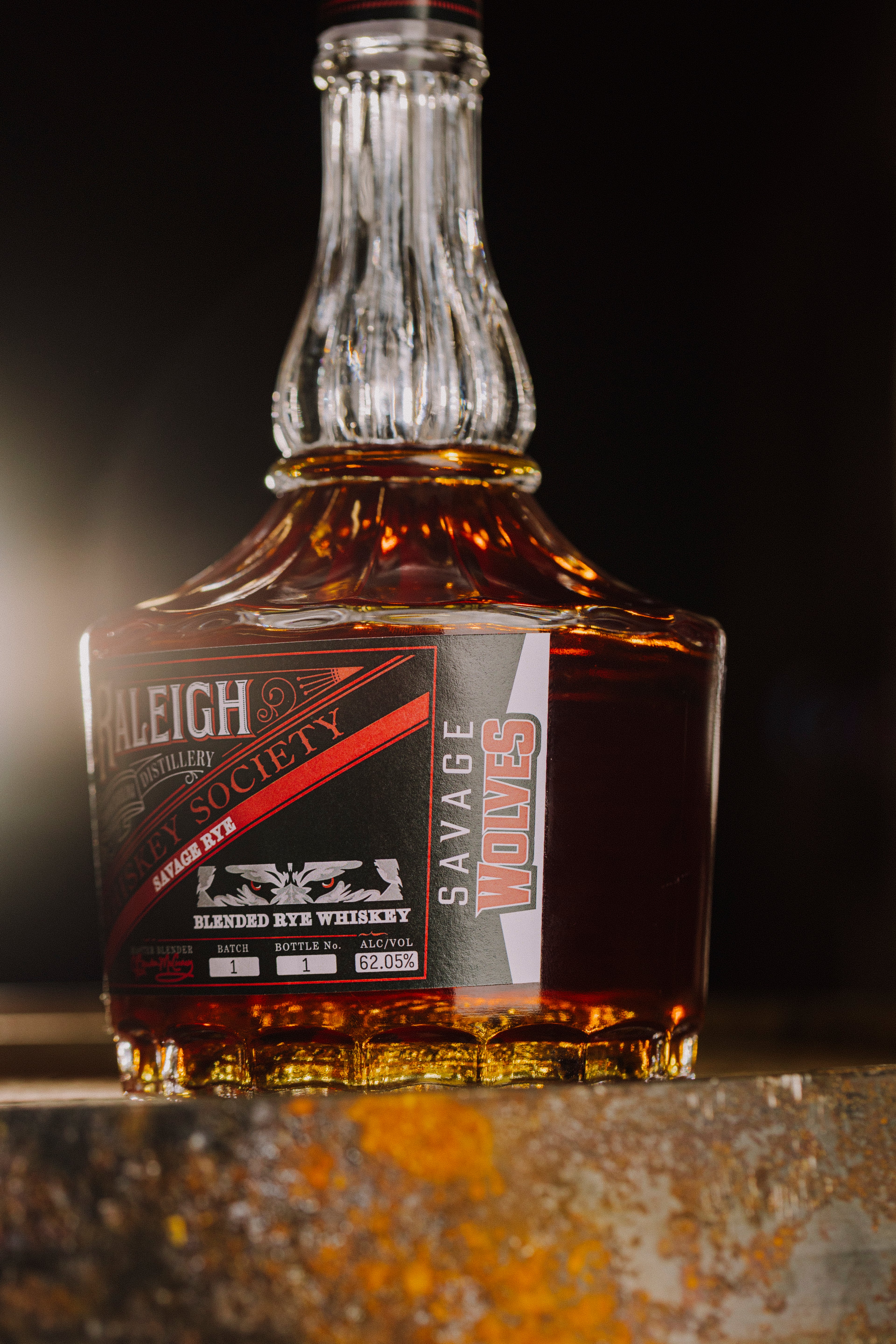 side view of savage rye whiskey bottle