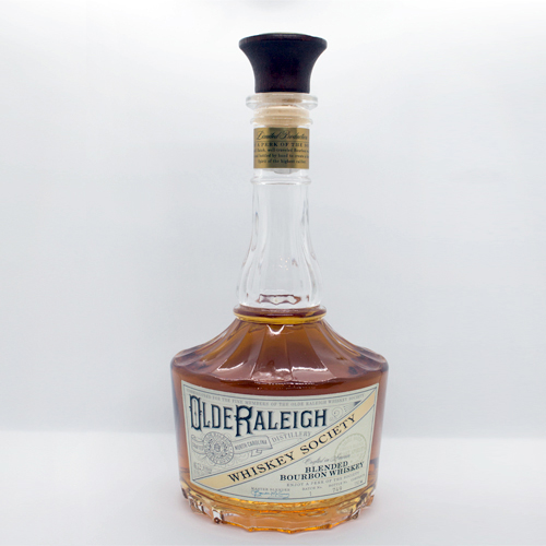 Olde Raleigh Whiskey Society bottle with white backdrop