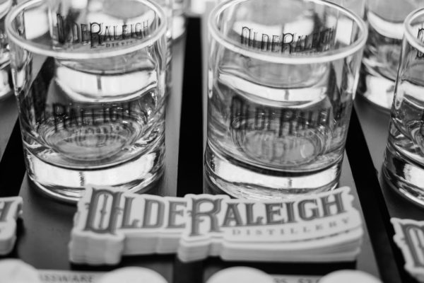 olde raleigh disttilery sticker and rocks glass