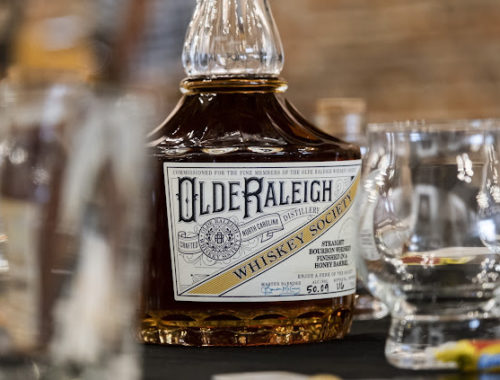 Olde Raleigh Whiskey Society bottle and glasses