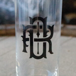 highball glass with old raleigh distillery logo