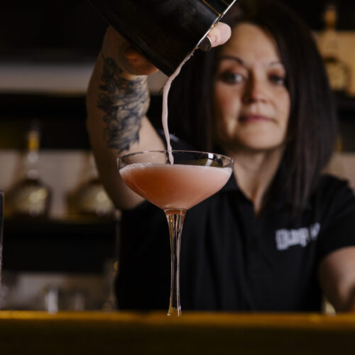bartender mixing an olde raleigh cocktail